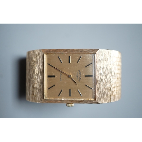 1895 - A gentleman's early 1970's textured 9ct gold Rotary manual wind dress wrist watch, with baton numera... 