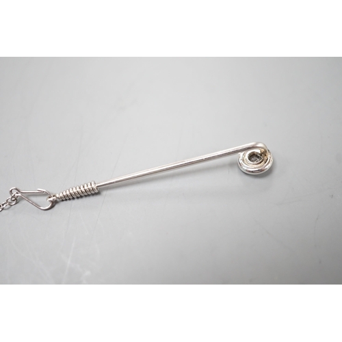 1905 - A white metal and collet set solitaire diamond tie pin, 43mm, with safety chain, gross weight 2.1 gr... 