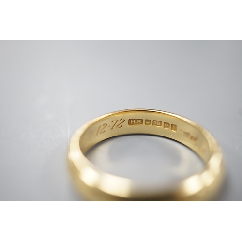 1912 - A 1970's 18ct gold wedding band, with engraved inscription, size O/P, 6.7 grams.