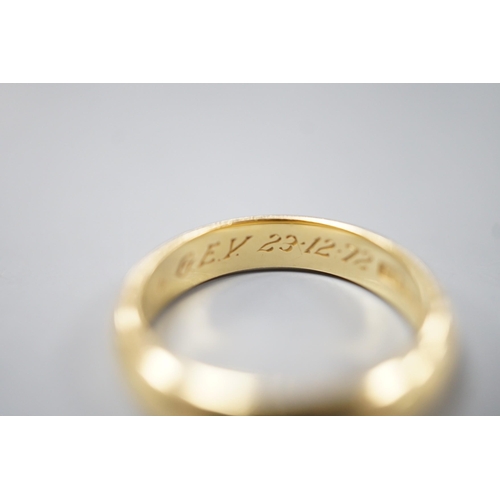 1912 - A 1970's 18ct gold wedding band, with engraved inscription, size O/P, 6.7 grams.