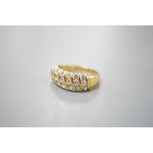 1917 - A modern 18ct gold and twenty one stone diamond set seven row half hoop ring, size N, gross weight 4... 