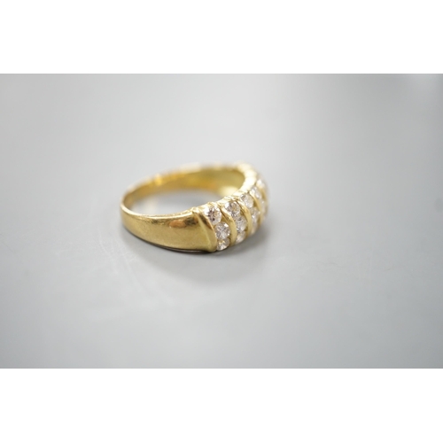 1917 - A modern 18ct gold and twenty one stone diamond set seven row half hoop ring, size N, gross weight 4... 