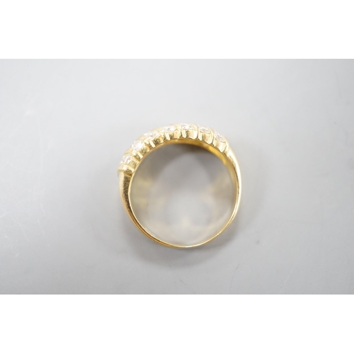 1917 - A modern 18ct gold and twenty one stone diamond set seven row half hoop ring, size N, gross weight 4... 