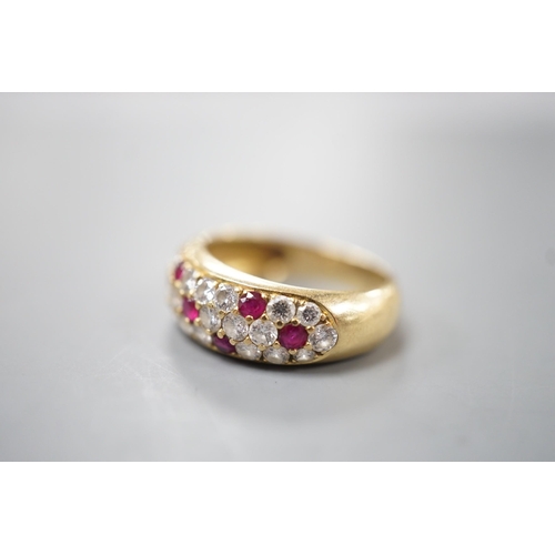 1918 - A modern yellow metal, ruby and diamond cluster set half hoop ring, size L/M, gross weight 4.5 grams... 