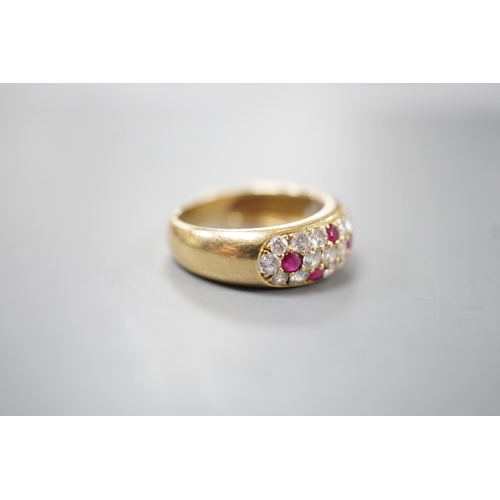 1918 - A modern yellow metal, ruby and diamond cluster set half hoop ring, size L/M, gross weight 4.5 grams... 