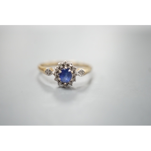 1919 - A modern 9ct gold, sapphire and diamond set cluster ring, size R, gross 2.3 grams.