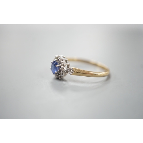 1919 - A modern 9ct gold, sapphire and diamond set cluster ring, size R, gross 2.3 grams.