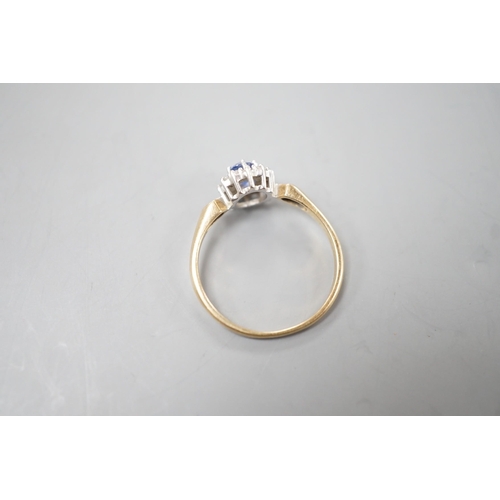 1919 - A modern 9ct gold, sapphire and diamond set cluster ring, size R, gross 2.3 grams.