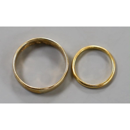 1920 - A 9ct gold wedding band, 3.8 grams and a small 22ct gold wedding band, 2.4 grams.