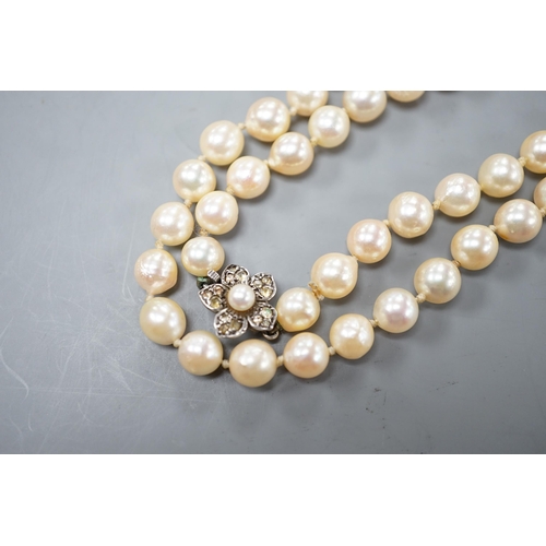 1925 - A single strand culture pearl necklace with cultured pearl set sterling clasp, 74cm.