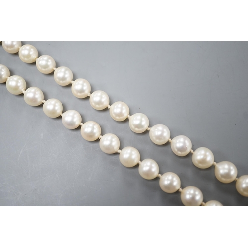 1926 - A modern single strand cultured pearl necklace with 750 white metal clasp, 42cm.