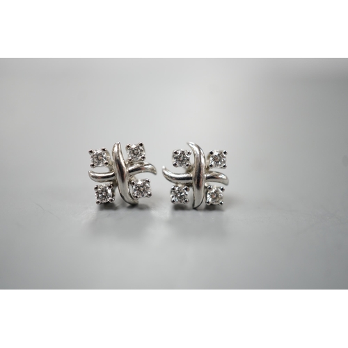 1933 - A modern pair of Tiffany & Co platinum and four stone diamond set square cluster ear studs, 7mm, gro... 