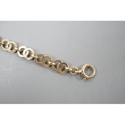 1934 - A modern 9ct gold interwoven circular link bracelet, 17.5cm, 8.3 grams.