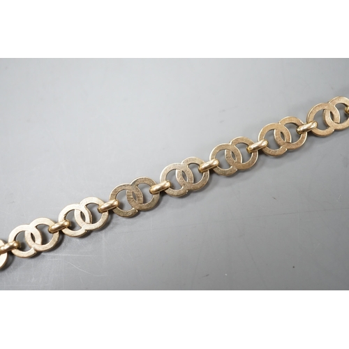 1934 - A modern 9ct gold interwoven circular link bracelet, 17.5cm, 8.3 grams.