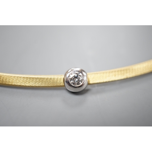 1942 - A modern 750 yellow metal and solitaire diamond set necklet, approx. 34-36cm, gross weight 8.2 grams... 