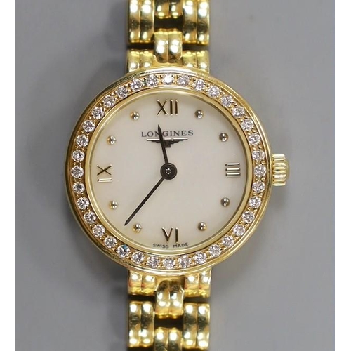 1951 - A lady's 18ct gold Longines quartz wrist watch, with mother of pearl dial and diamond chip set bezel... 