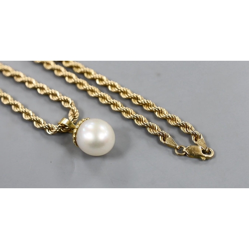 1952 - A modern 750 mounted cultured pearl pendant, overall 25mm, on a 375 ropetwist chain, 60cm, gross wei... 