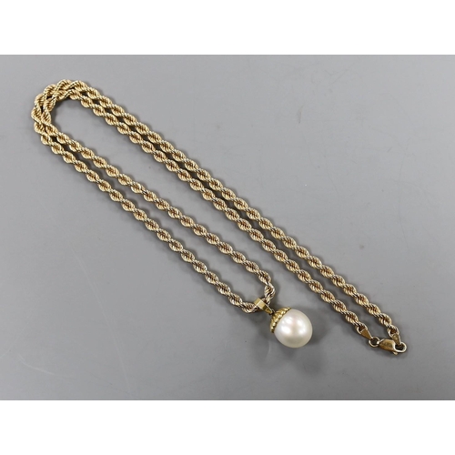 1952 - A modern 750 mounted cultured pearl pendant, overall 25mm, on a 375 ropetwist chain, 60cm, gross wei... 