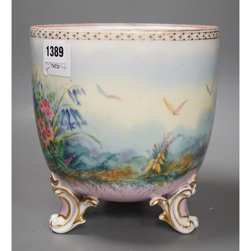 1389 - A French porcelain landscape painted jardiniere, 23cm