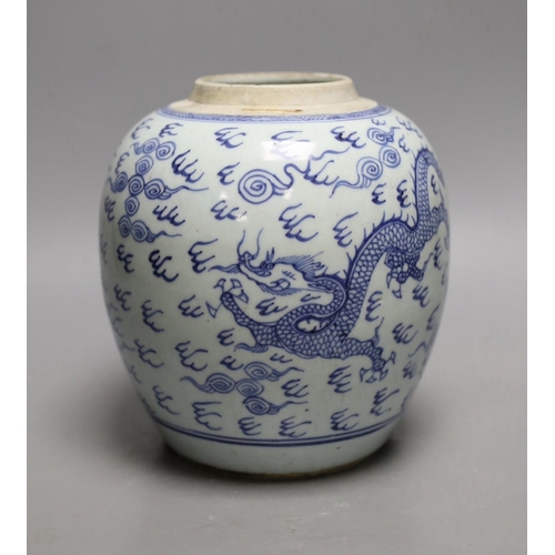 1404 - An 18th century Chinese provincial blue and white dragon and phoenix jar, 20cm high Provenance- the ... 