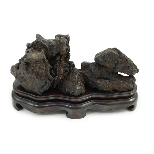 1590 - A Chinese scholar's stone with wood stand