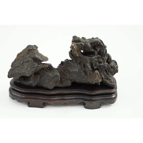 1590 - A Chinese scholar's stone with wood stand