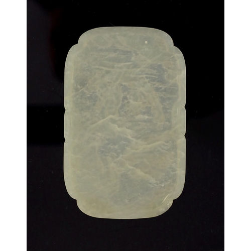 1592 - A Chinese white jade He Xiangu shaped rectangular plaque, 18th/19th century, carved in relief with... 