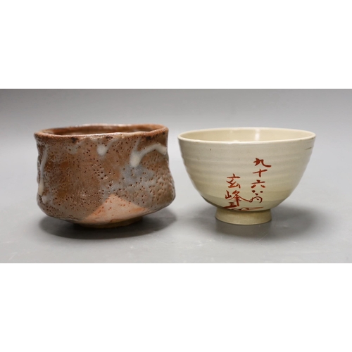 1600 - Two Japanese studio pottery chawan tea bowls, one with raku glaze, 12cm diameter