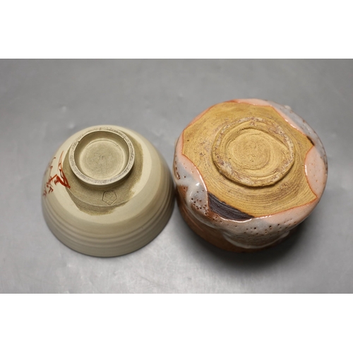 1600 - Two Japanese studio pottery chawan tea bowls, one with raku glaze, 12cm diameter