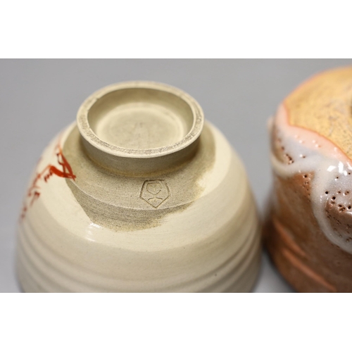 1600 - Two Japanese studio pottery chawan tea bowls, one with raku glaze, 12cm diameter