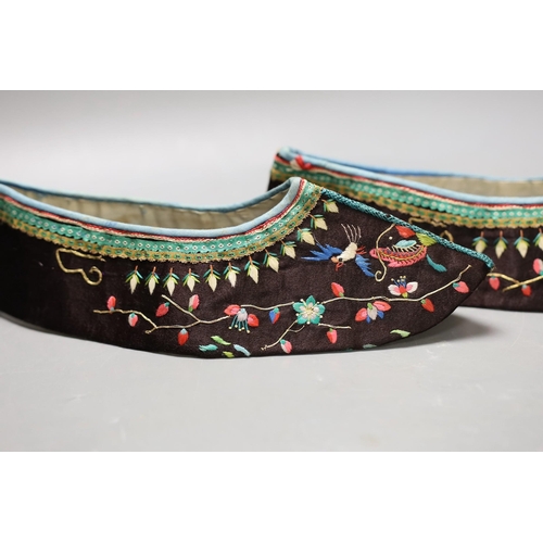 1601 - A pair of Chinese embroidered silk shoes, upper section only