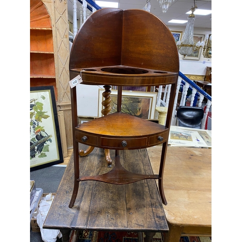 100 - A George III mahogany bow front corner washstand, width 54cm, depth 36cm, height 111cm