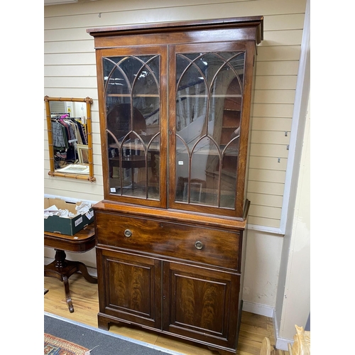 103 - A Regency mahogany secretaire bookcase, length 112cm, depth 55cm, height 229cm