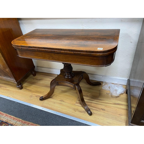 105 - A Regency amboyna banded rosewood D shape folding card table, width 92cm, depth 46cm, height 72cm... 