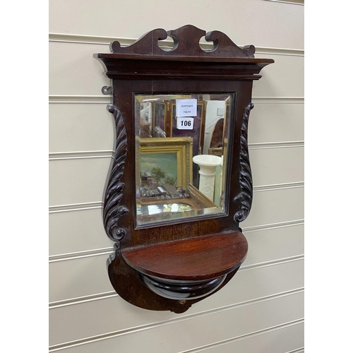 106 - A late Victorian mahogany mirrored wall bracket, width 33cm, height 56cm