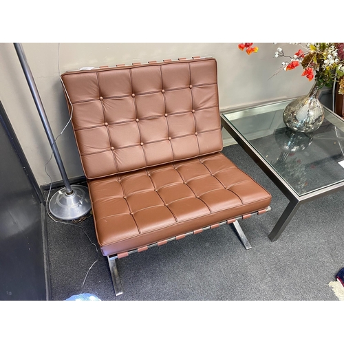 116 - A pair of Barcelona style brown leather and chrome chairs, width 76cm, depth 78cm, height 73cm... 