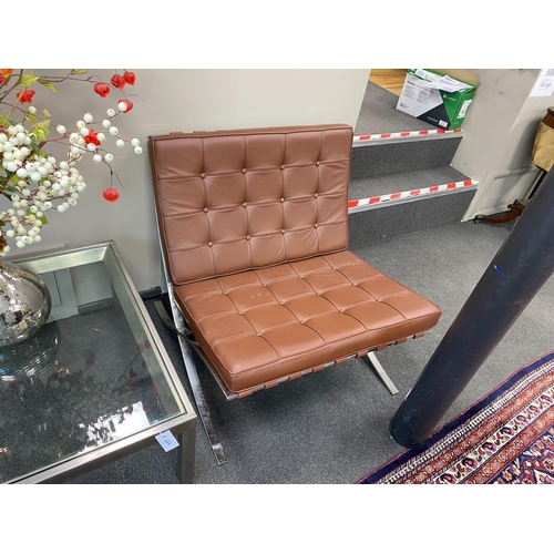 116 - A pair of Barcelona style brown leather and chrome chairs, width 76cm, depth 78cm, height 73cm... 