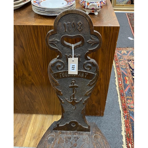 121 - A Victorian carved oak spinning chair, by repute made from the timbers of HMS Foudroyant, dated 1897... 