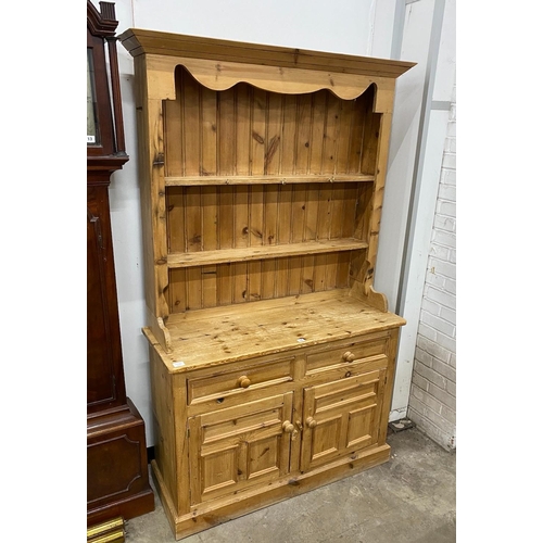 14 - A Victorian style pine kitchen dresser, width 117cm, depth 43cm, height 194cm