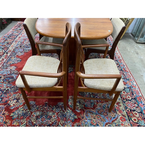 22 - A mid century teak extending dining table, length 214cm extended, one spare leaf, width 108cm, heigh... 