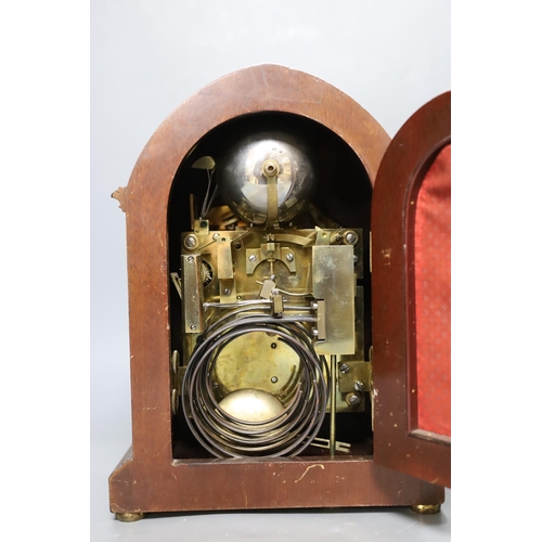 251 - A George V inlaid walnut lancet shaped chiming mantel clock, with German movement and 15th July 1914... 