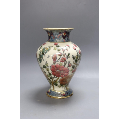 256 - An early 20th century Zsolnay Persian style pottery vase. 26cm tall