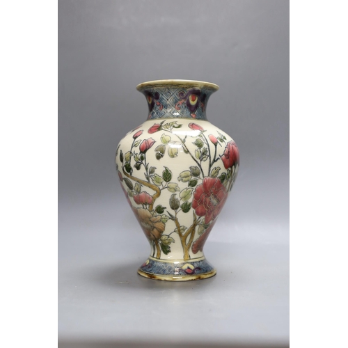 256 - An early 20th century Zsolnay Persian style pottery vase. 26cm tall