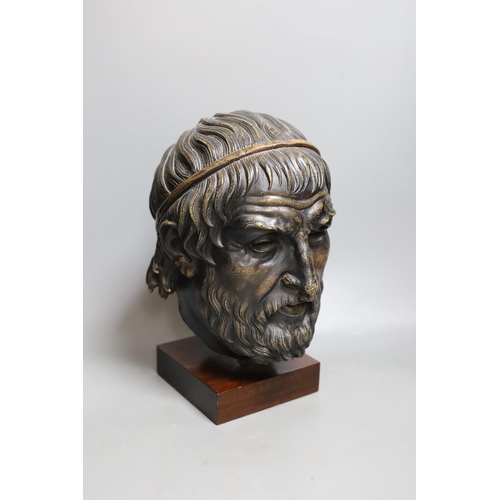 270 - A bronzed composition figure of a classical head. 32cm tall