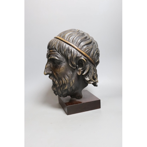 270 - A bronzed composition figure of a classical head. 32cm tall