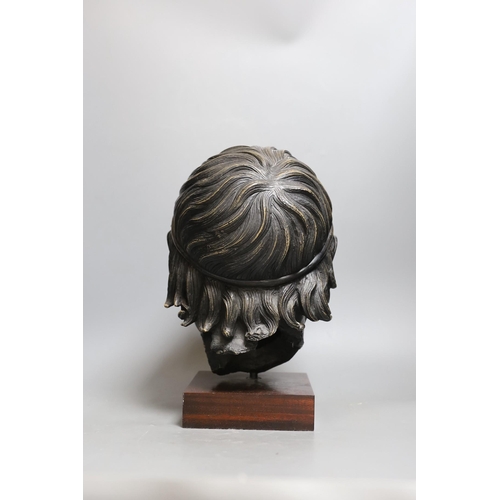 270 - A bronzed composition figure of a classical head. 32cm tall