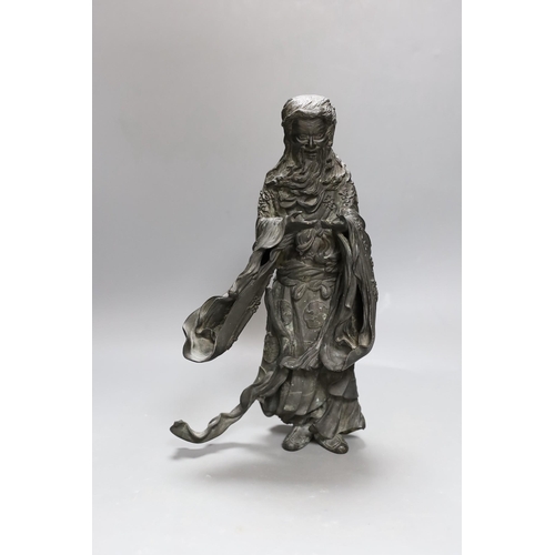 271 - A heavily cast Japanese bronze figure of a bearded man with flowing robes, Meiji period, 31cm tall... 