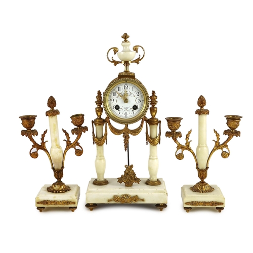 275 - A Louis XVI style ormolu mounted white marble eight day mantel clock and a matching pair of twin bra... 