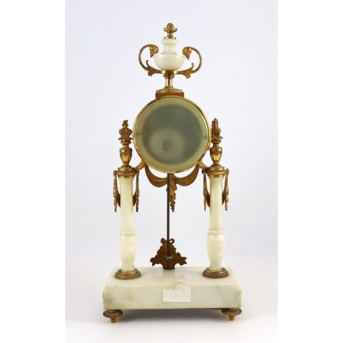 275 - A Louis XVI style ormolu mounted white marble eight day mantel clock and a matching pair of twin bra... 