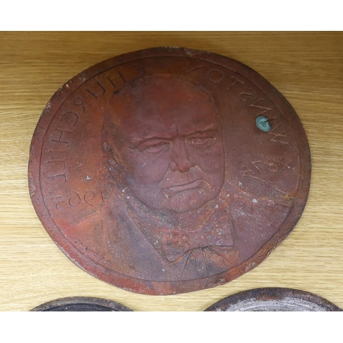 276 - A group of six various cast copper or bronze medallion roundels. Largest 28cm diameter